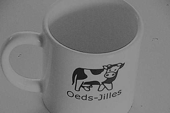 Mok met afbeelding van een koe